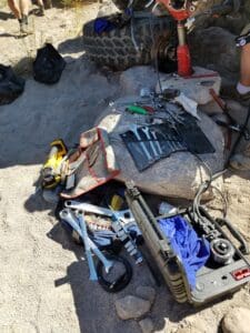 A pile of junk sitting on top of the ground.