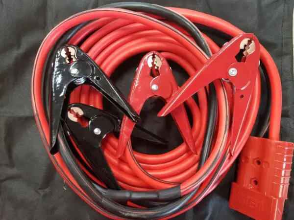 A red and black jumper cable with two clamps.