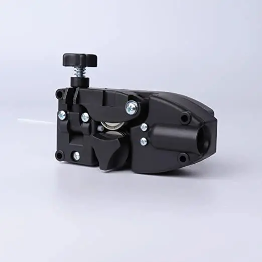 A black motor is sitting on the ground