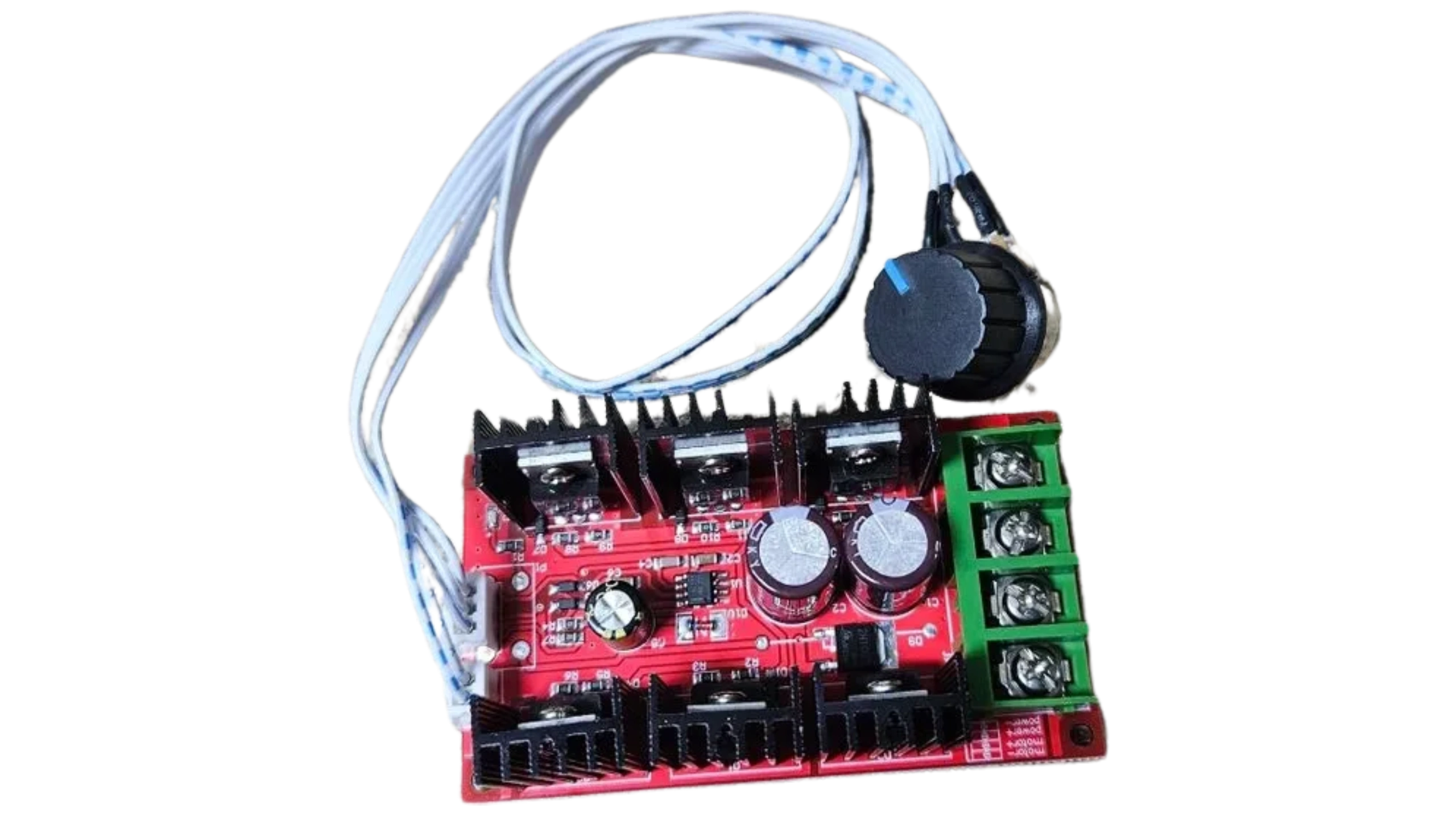 A red board with wires and a button