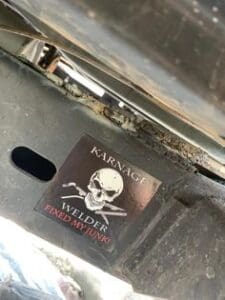 A sticker with a skull and crossbones on it.